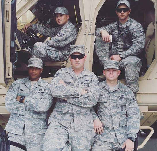 Josh Gee (front right) and members of the Air Force National Guard 125th fighter wing.